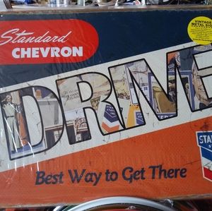 Chevron automotive metal sign